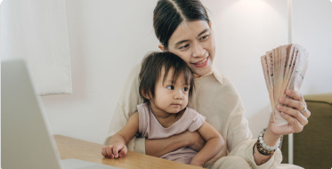 Mother and daughter looking at their child support payment