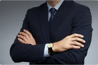 Markham lawyer in a suit with his arms crossed